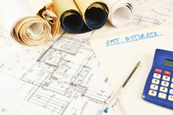 House renovation blueprint, note pad and a calculator